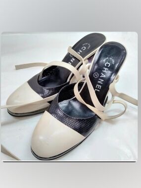 CHANEL Two-Tone Cream and Black Perforated Slingback Mules